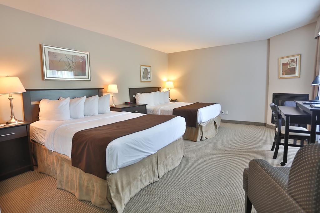 Hotel Le Versailles Saint-Sauveur-des-Monts Habitación foto